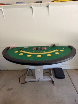 Blackjack table w/ cards & chips