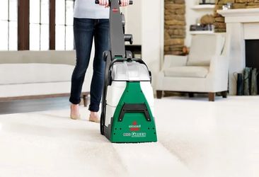 Big green carpet cleaner with all attachments