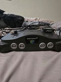 Nintendo 64 with games and controller