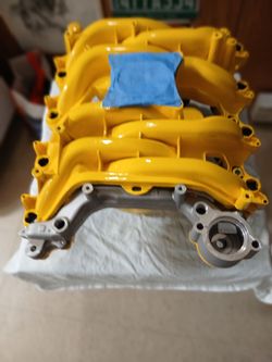 Ford 4.6 liter intake with parts an throttle body gaskets  new in box