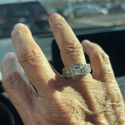 Gold 1 karat from zales big diamond with lots of small ones