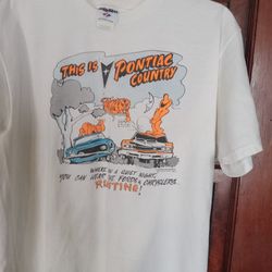 This Item Is a Vintage Jerzees brand T-Shirt featuring Graphics promoting "Pontiac  County "Pontiac GTO Nike!