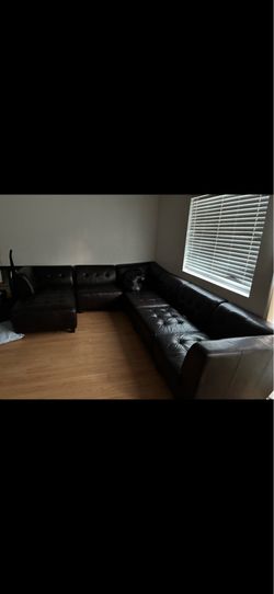 Brown leather sectional couch