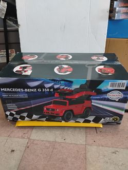 Black Mercedes-Benz G 350 d foot to floor ride on 12 to 36 months push along