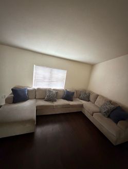 Large Beige U-Shaped Sectional Sofa