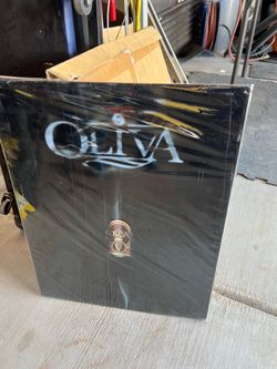 Olivia Cigar metal sign
