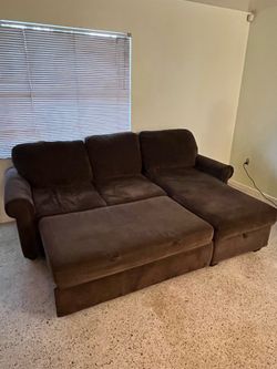 Brown pull out couch