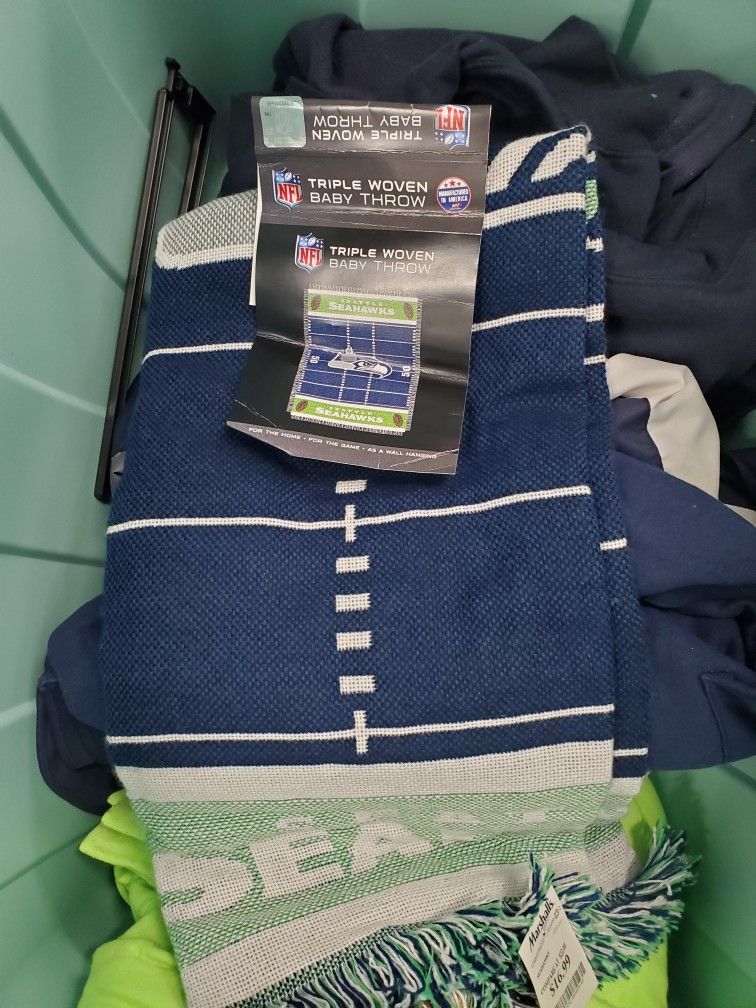 Good Condition Pet N Smoke Free Home USED Seahawks Purse $30. Blanket New NEVER Used $30.