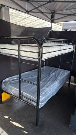 Twin/ twin bunk bed. With memory foam mattress