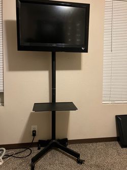 Tv stand with 32 TV