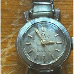 This is a vintage Omega Ladymatic women's automatic wristwatch in a silver-tone steel case