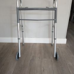 Medical two button folding walker