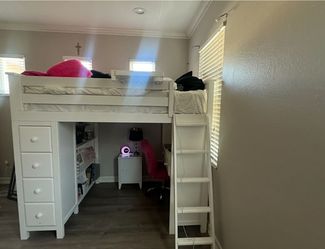Full size bed with attached desk & shelves& drawers