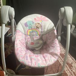 Baby girl baby swing it also vibrates