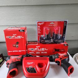 Milwaukee Fuel Impact/ Drill/Oscillating Tool/ Cut Off Tool+ 2 Batteries 