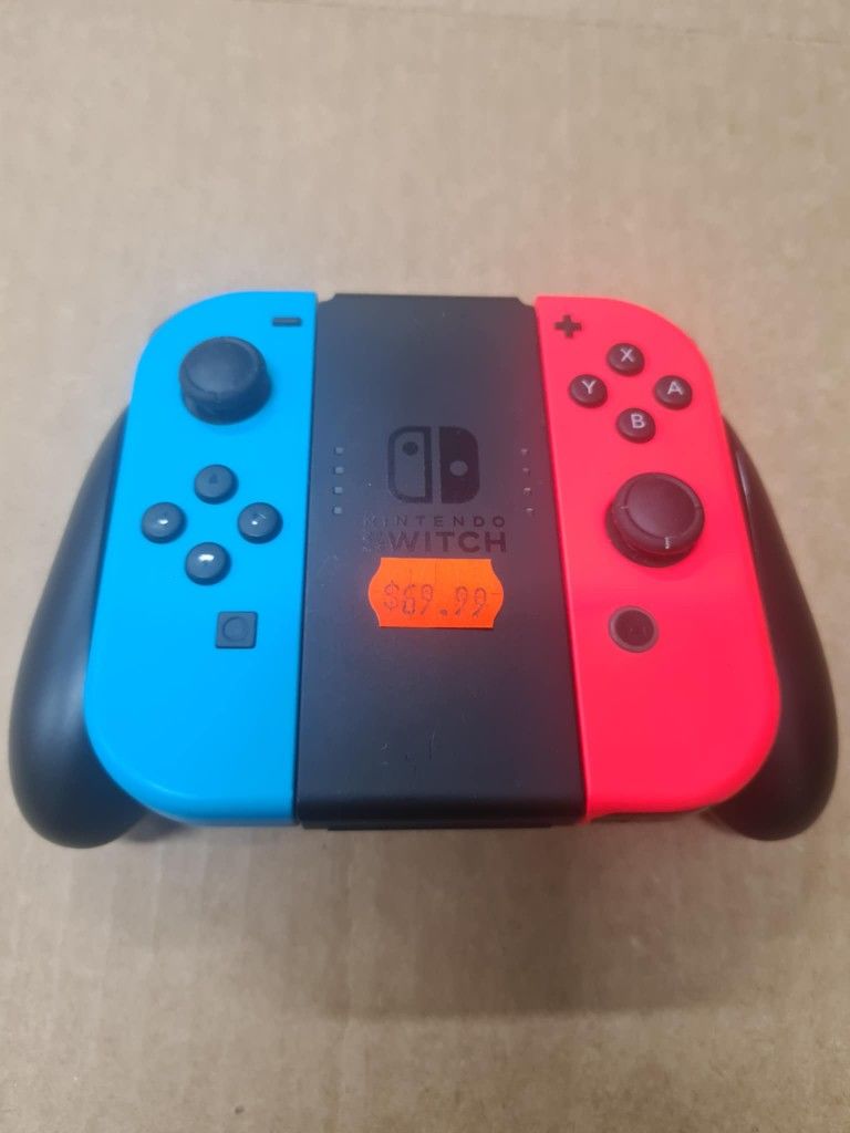 Nintendo Switch - Joy-Con (L/R) - Left Neon Red/ Right Neon Blue Controllers With Grip
