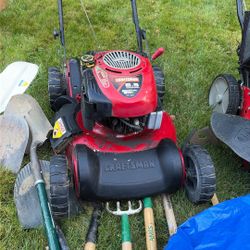 Craftsman 6.5 Horsepower 21 Inch Cut Easy Walk Propelled Lawnmower With A Briggs & Stratton Mower