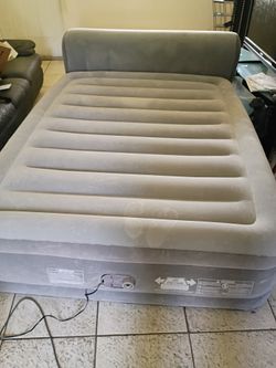 Portable self inflating bed