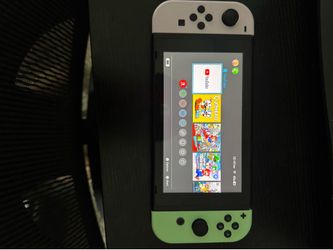 Nintendo switch with dock and pastel controller