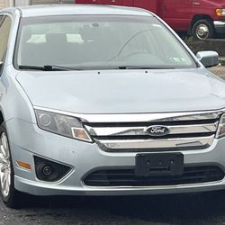 2011 Ford Fusion Hybrid.      Low Miles