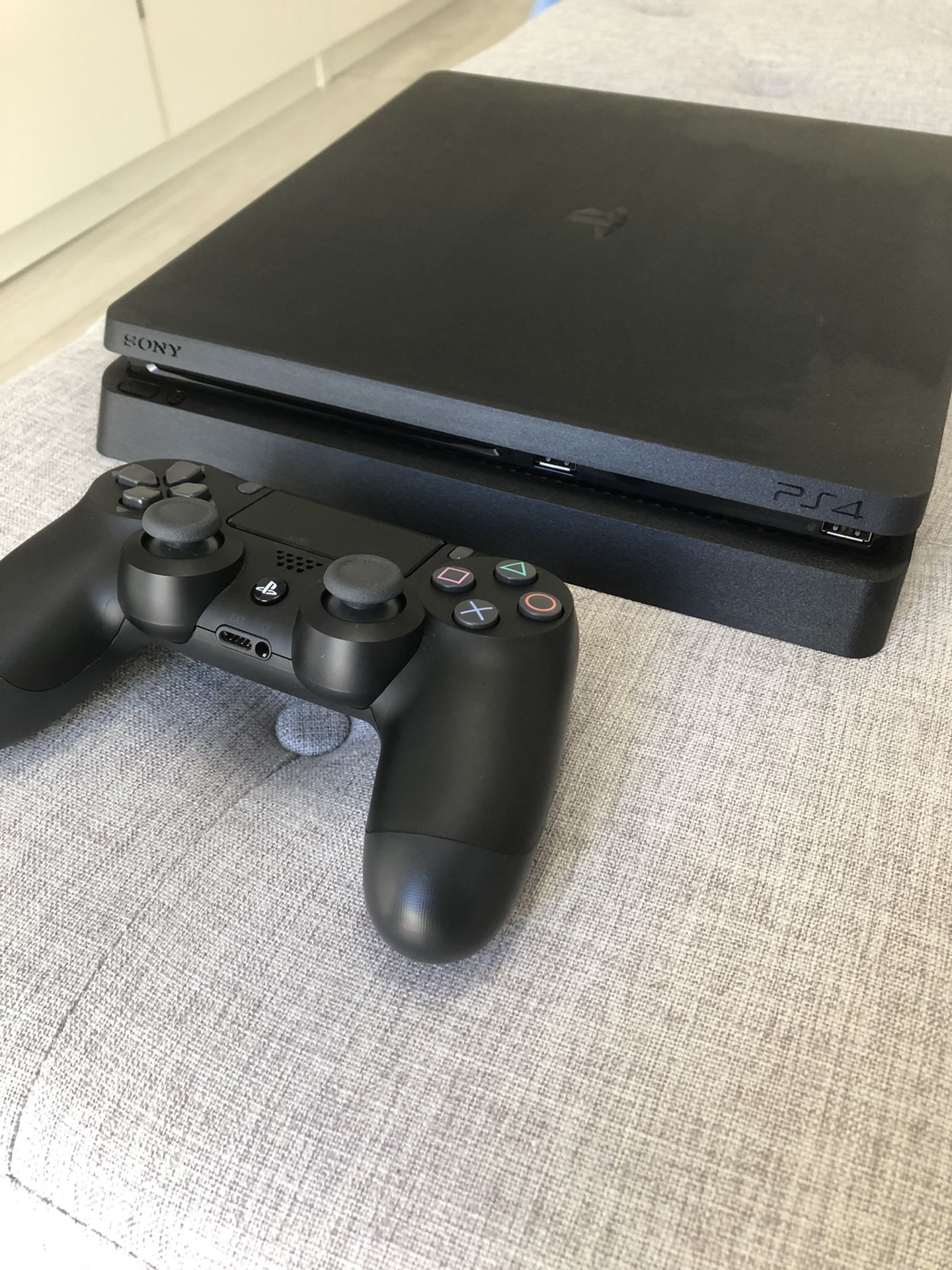 New PS4 Slim 1TB with controller + 3 games!