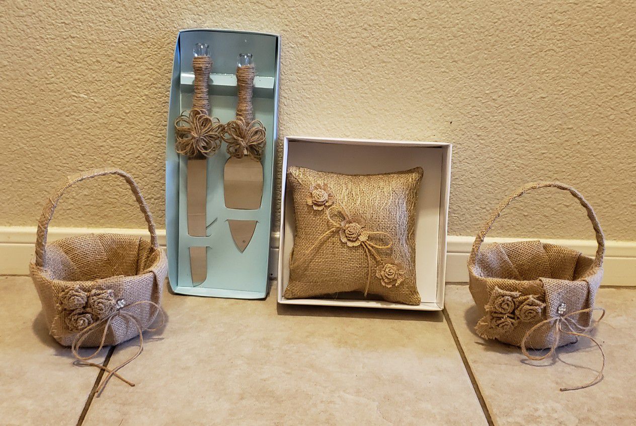 Wedding toppers, ring pillow, flower baskets, cake knives and spatula
