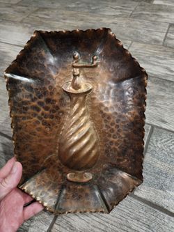Vintage hammered copper wall plaque with raised pepper/coffee mill