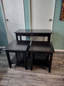 Two living room side tables and one entry way table