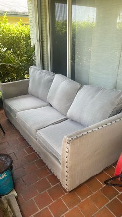 Gray couch with pull out bed
