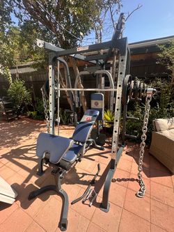 OLYMPIC SQUAT RACK SMITH MACHINE WITH OLYMPIC WEIGHTS AND BENCH