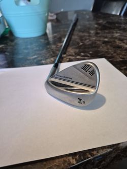 TaylorMade Milled Grind Hi-Toe 54°/10° wedge.