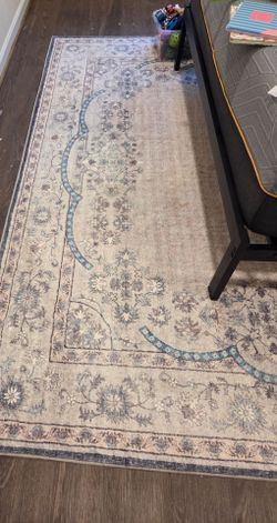 2 rugs- 8x10 and 9x12