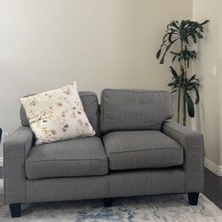 Comfy grey loveseat great condition!
