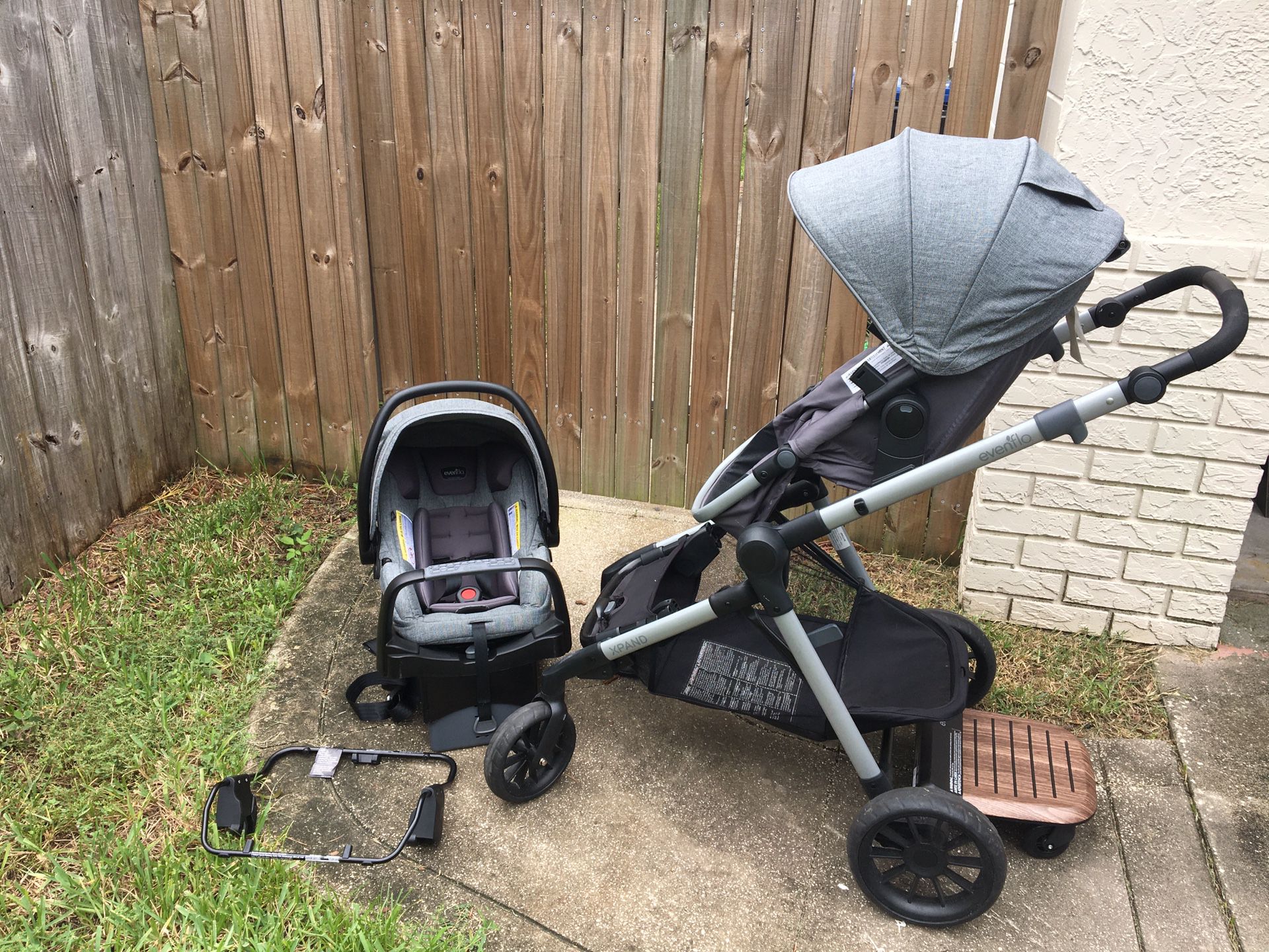 Evenflo Pivot Xpand double stroller with rider board
