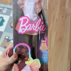 Barbie Fashionistas Doll with Tall Body, Black Straight Hair & Peach Dress, 65th Anniversary