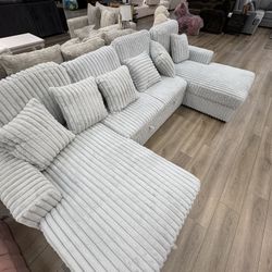 NEW SILVER CORDUROY SOFA WITH PULL OUT SOFA AND DOUBLE STORAGE CHAISE
