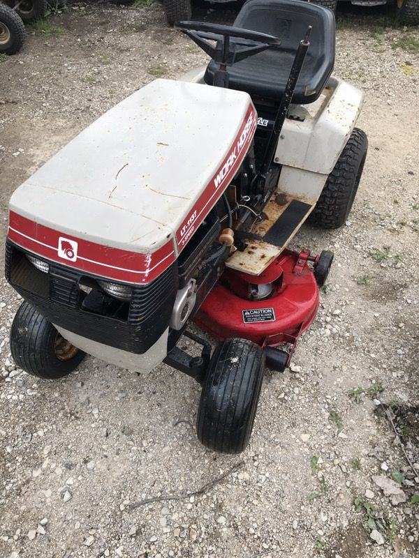 Wheel horse riding mower