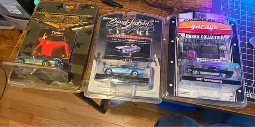 3 1/64 mustangs and Camaro lot