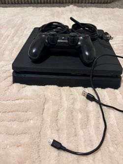 Sony PlayStation 4 Slim Console with Two Controllers