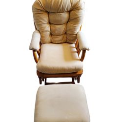Glider rocking chair with an ottoman.