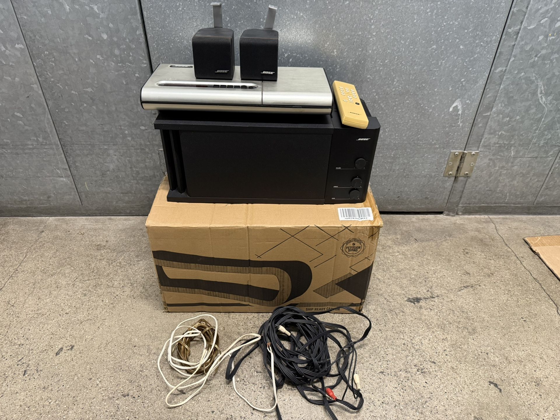 Bose Lifestyle Model 5 Music Center + Acoustimass 3 + 2 Cube Speakers   "There is no music center power adapter."