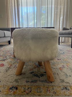 White faux fur stool