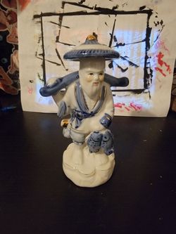 Vintage Chinese porcelain fisherman