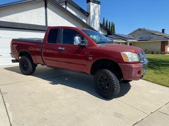 2004 Titan 4x4 6,000 obo