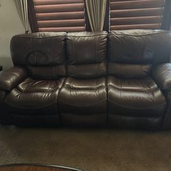 Two power Leather Recliner Couches