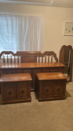 Solid wood vintage 7-piece King bedroom set with dark walnut-tone finish. Heavy, durable construction.