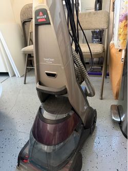 BISSELl carpet cleaner vacuum machine