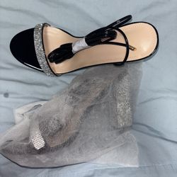 Black High Heels with rhinestones. 
