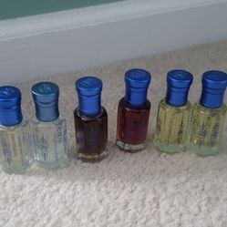 6 barely used abdul samad al qurashi perfume oils. ($30 each for 5) and (rose one is $100 )