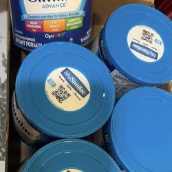 Multiple Similac Blue Cans